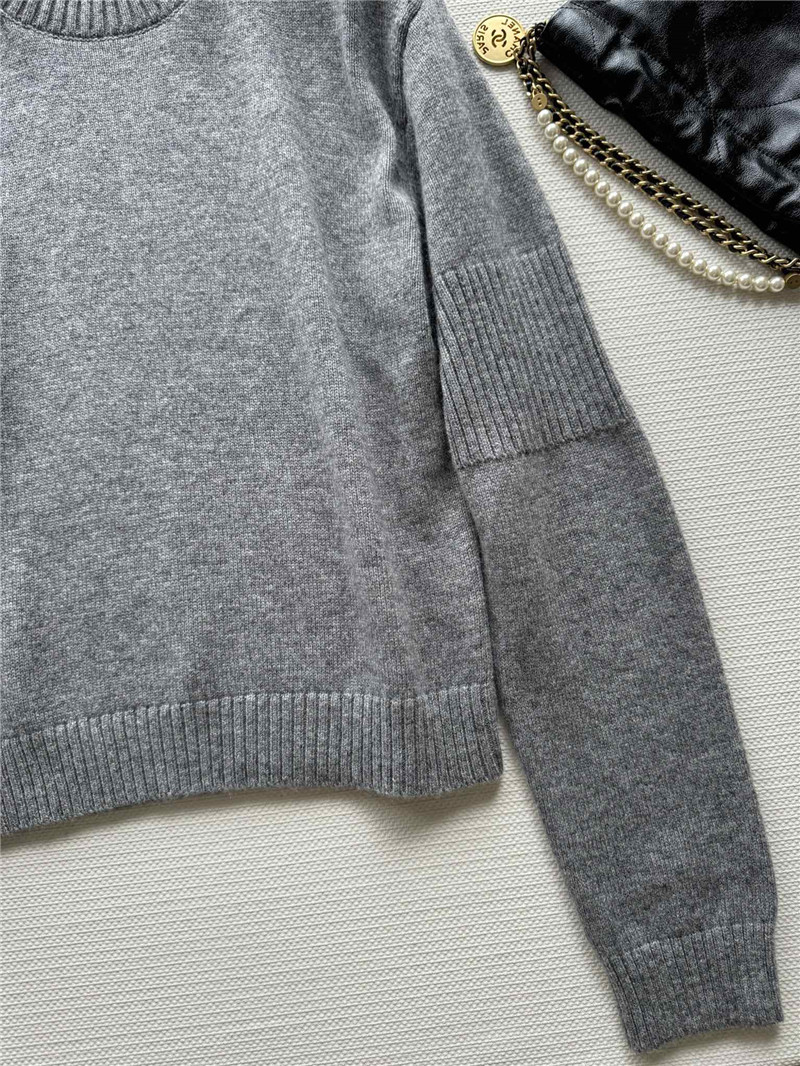 Ch**el logo shoulder buttons cashmere sweater