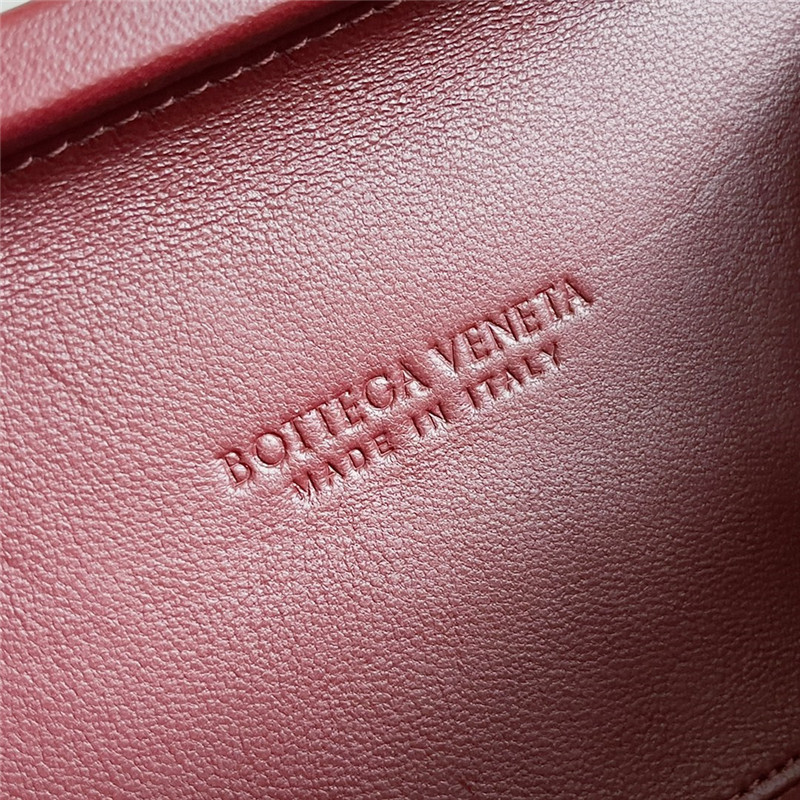 b0tt*ga Ven*ta wine red knot clutch
