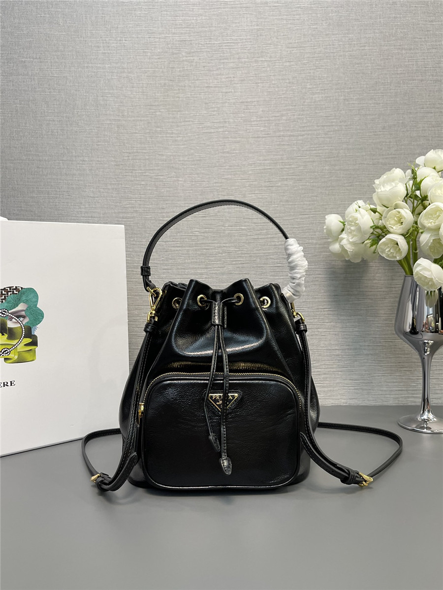 Pra*a black leather bucket crossbody bag