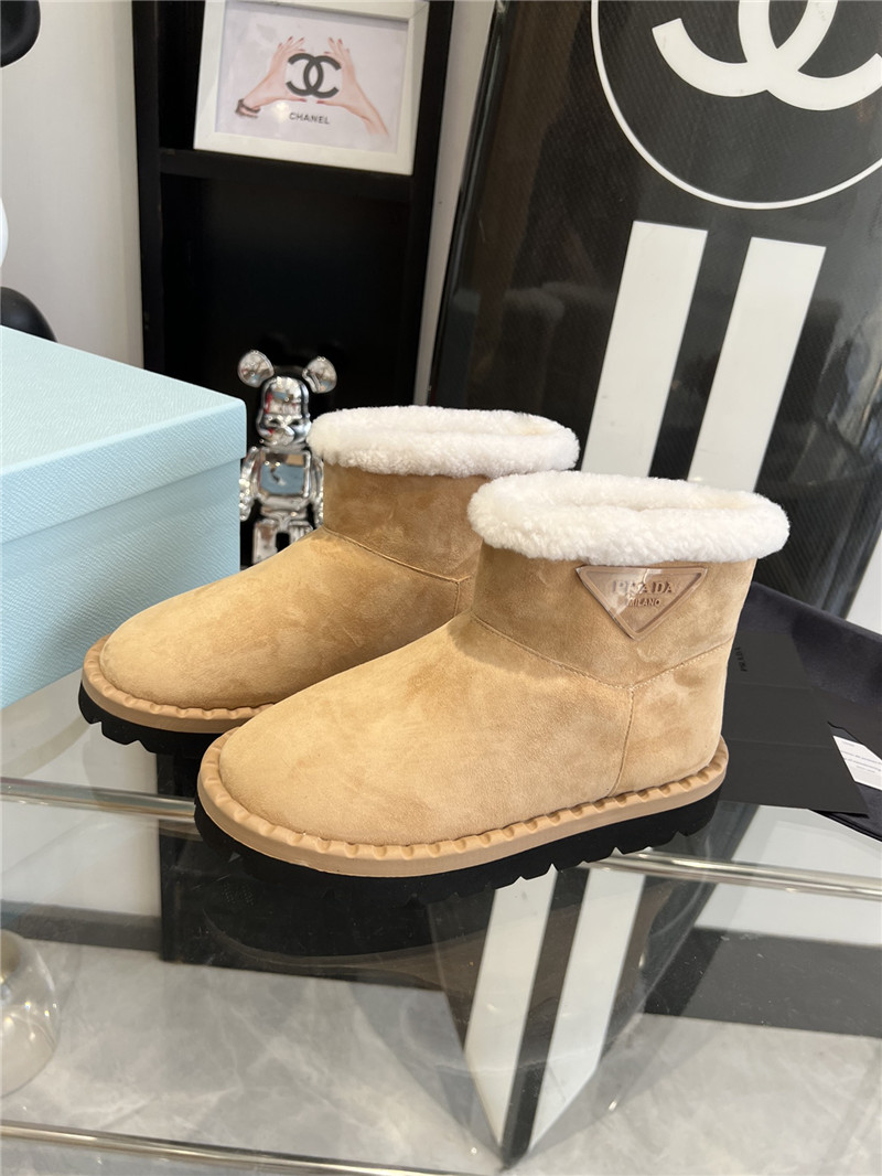 Pra*a triangle-logo suede boots