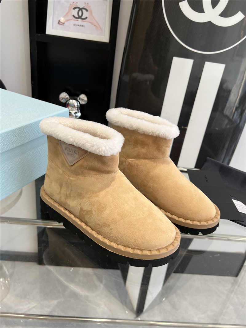 Pra*a triangle-logo suede boots