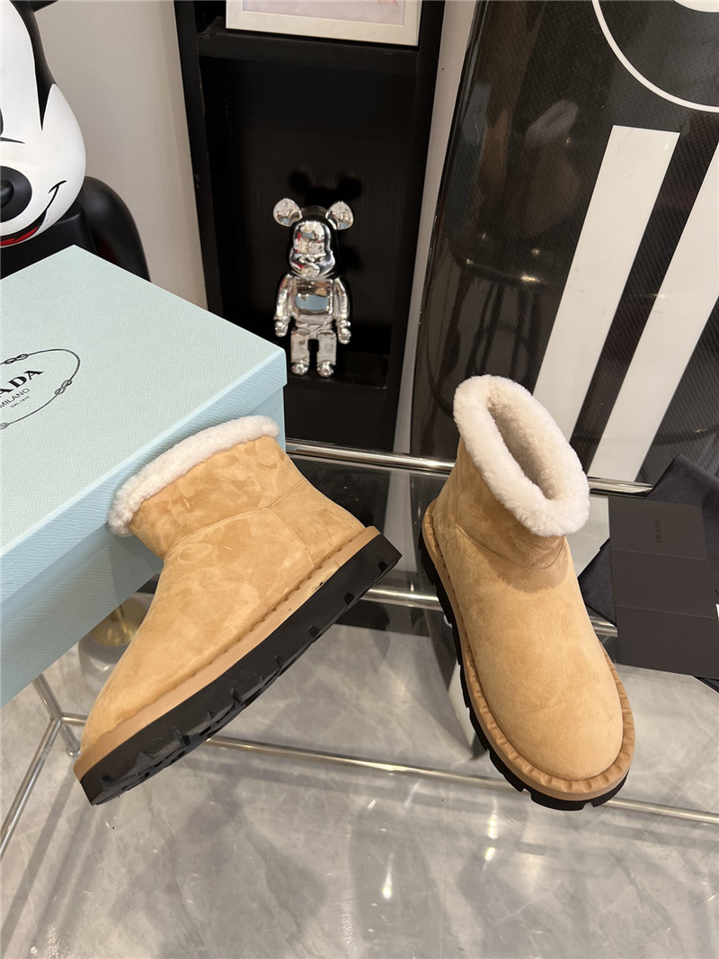 Pra*a triangle-logo suede boots