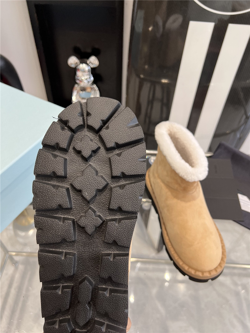Pra*a triangle-logo suede boots