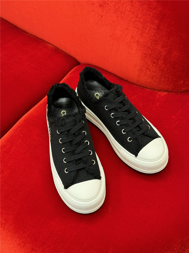 D10r women’s black platform sneakers