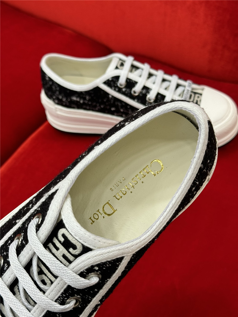 D10r women’s black & white platform sneakers