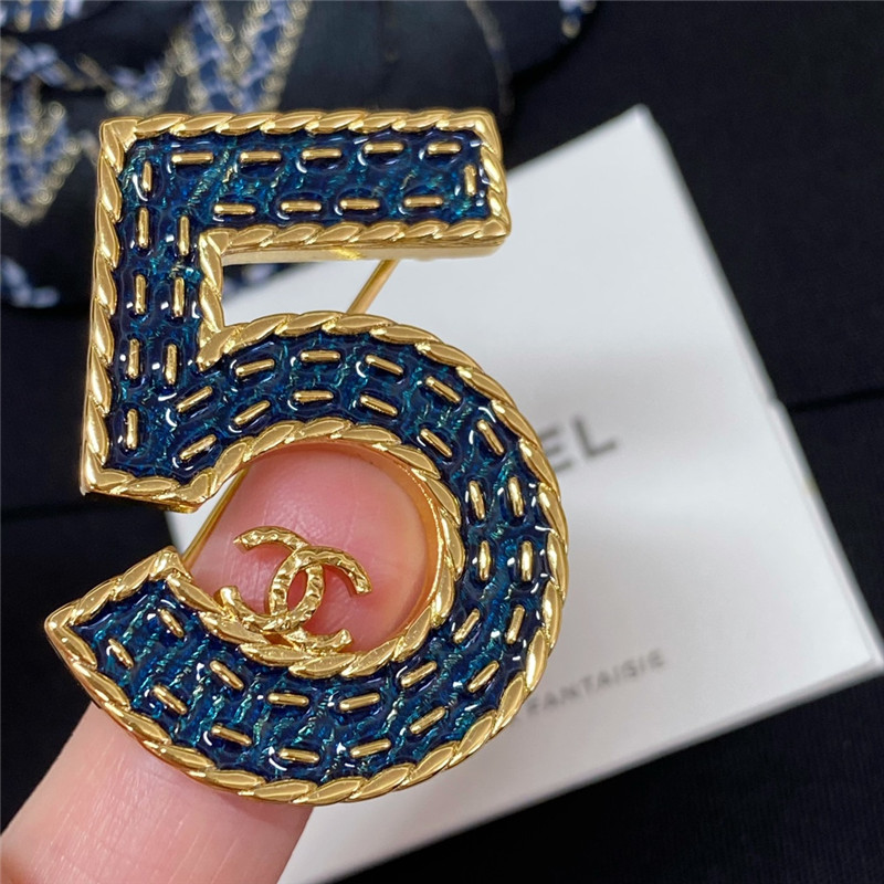 Ch**el denim 5 word double c brooch