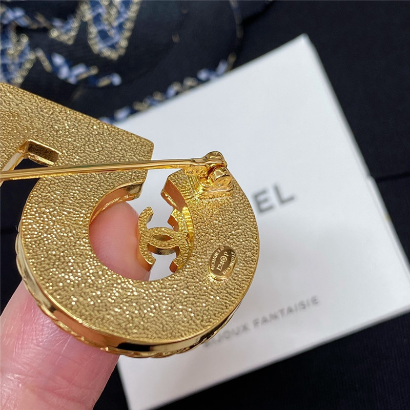Ch**el denim 5 word double c brooch
