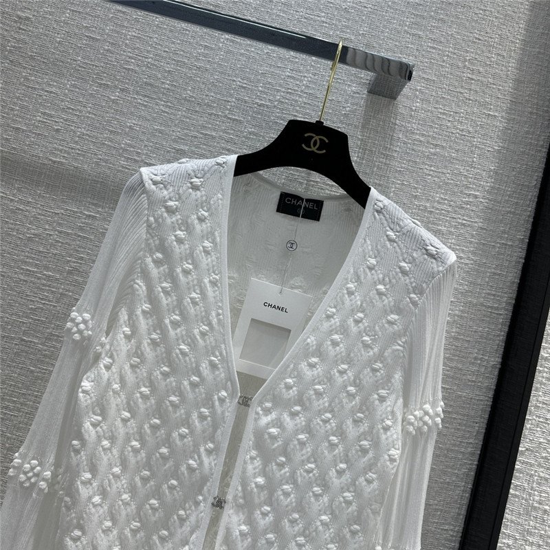 Ch**el hook fastening knitted cardigan in white