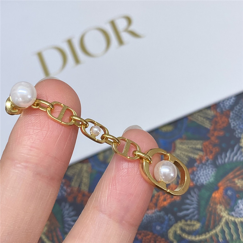 D10r u-shaped pearl tassel earrings