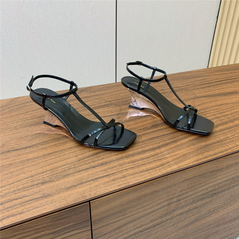 The R0w black patent leather wedge sandals