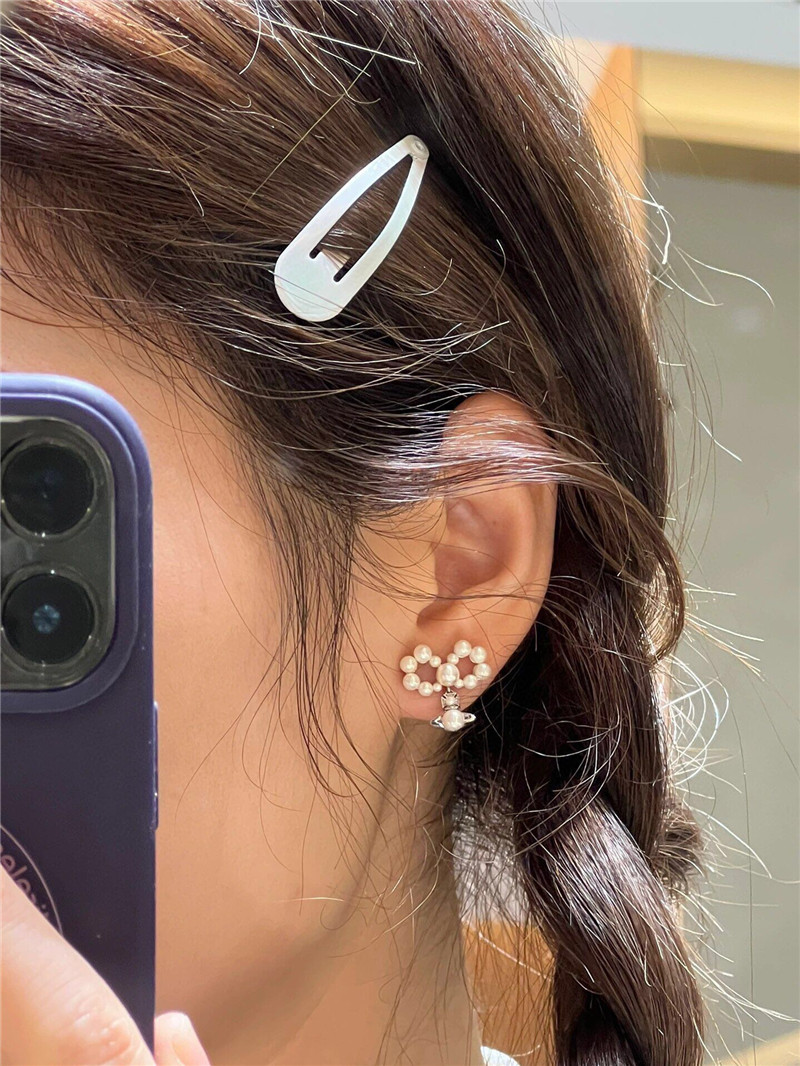 u1u1enne westwood bow saturn stud earrings