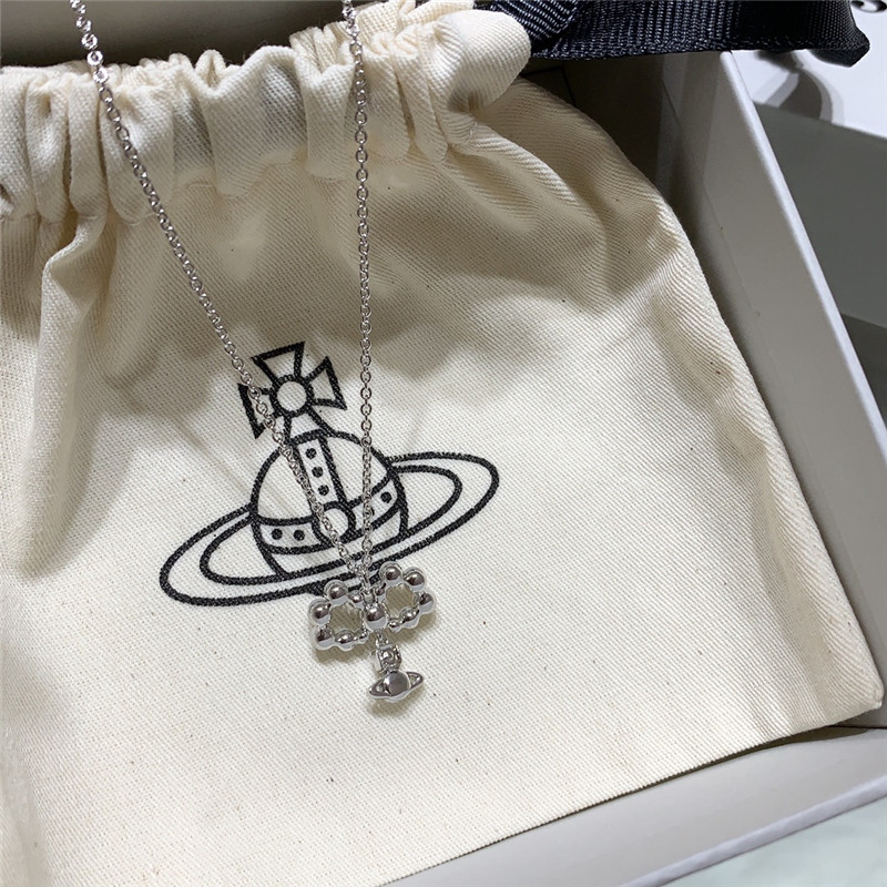 u1u1enne westwood bow saturn necklace