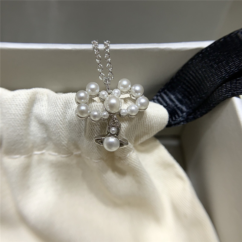 u1u1enne westwood bow saturn necklace
