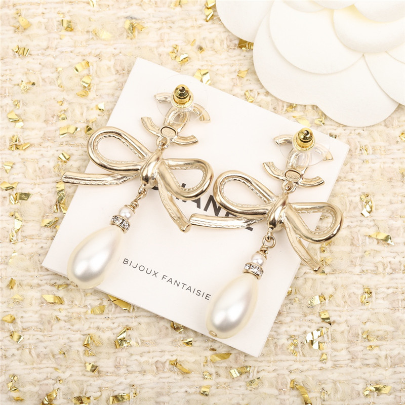 Ch**el bow pearl earrings