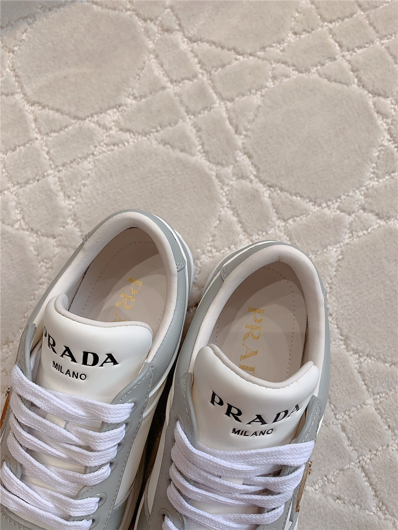 Pra*a triangle-logo brown lace-up sneakers
