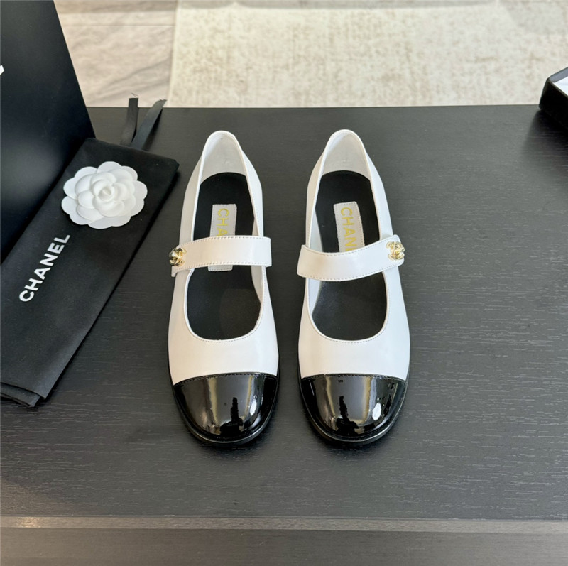 Ch**el gold interlock mary janes in white and black calfskin