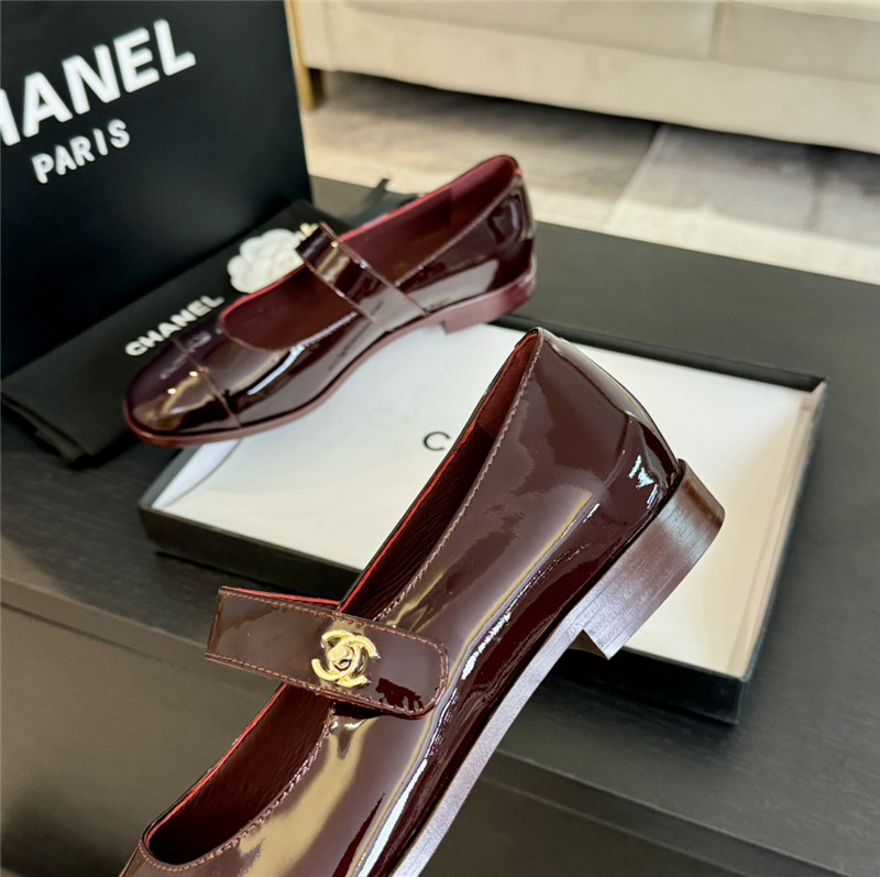Ch**el gold interlock mary janes in burgundy patent calfskin