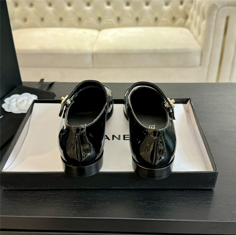 Ch**el gold interlock mary janes in black patent calfskin