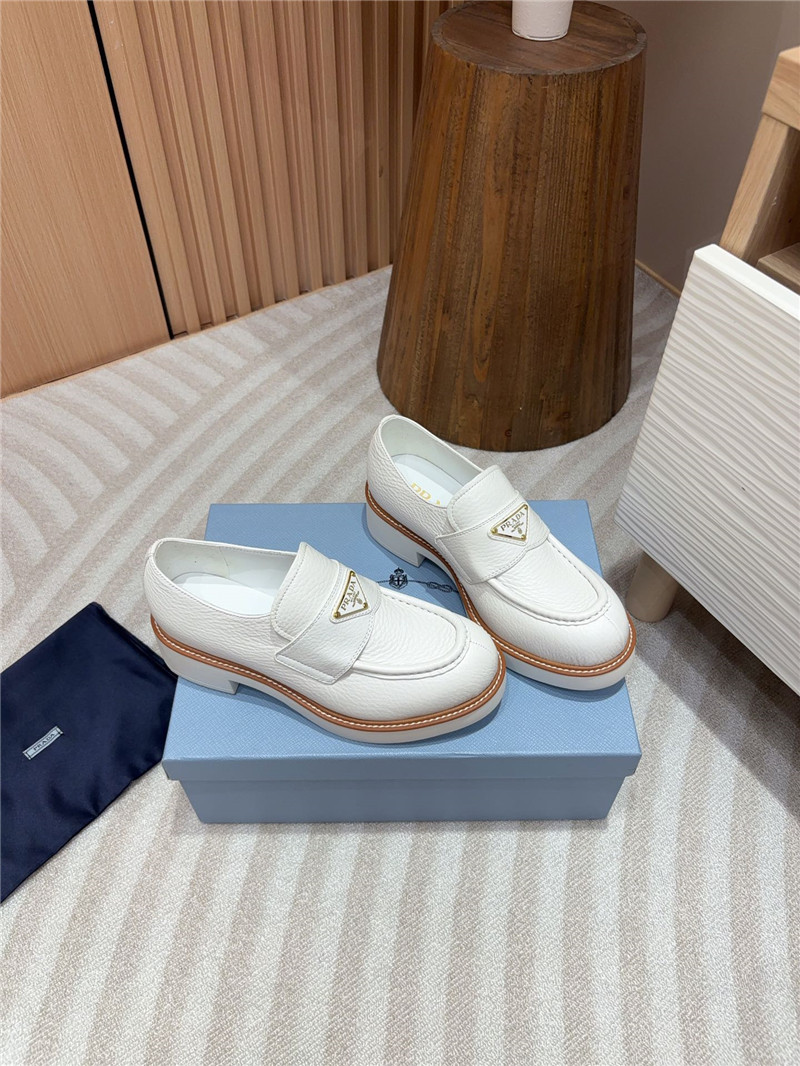 Pra*a white double chocolate leather loafers