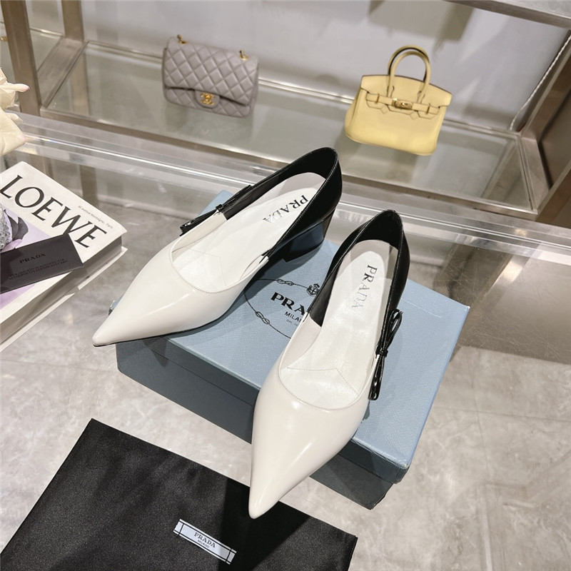 Pra*a chunky pointed pumps in black and white calfskin