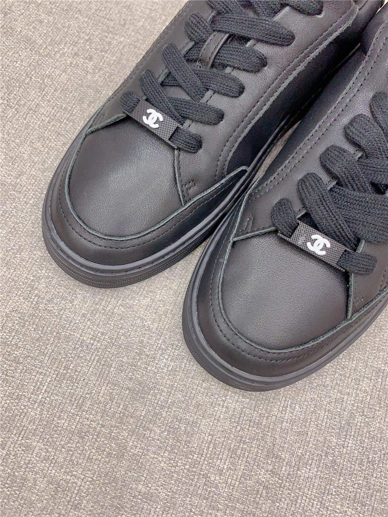 Ch**el black leather lace-up trainers