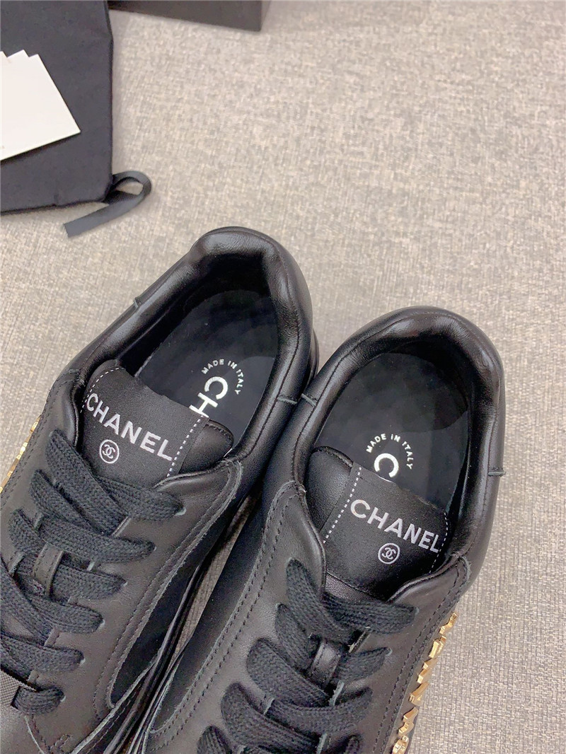 Ch**el black leather lace-up trainers