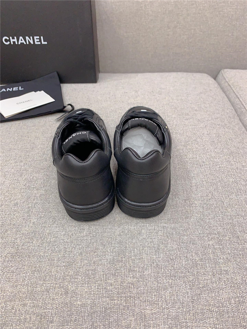 Ch**el black leather lace-up trainers