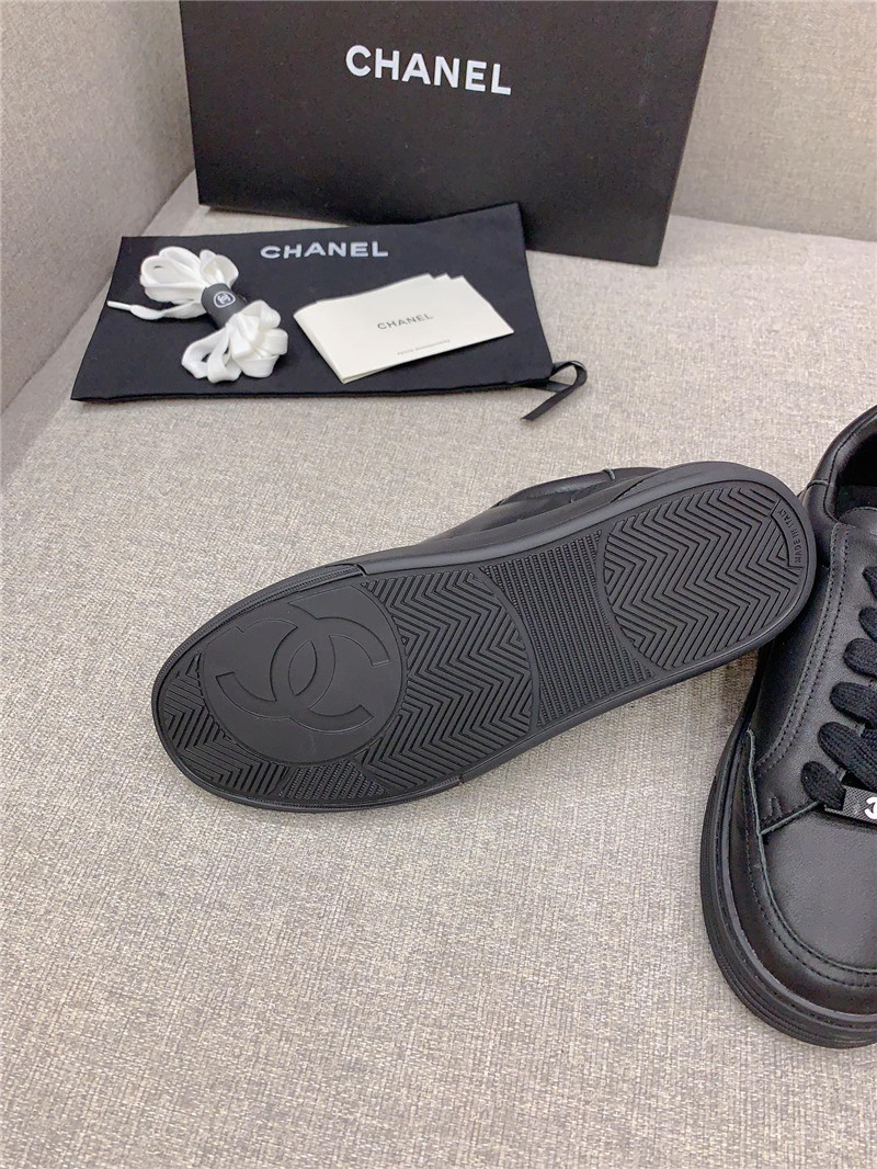 Ch**el black leather lace-up trainers