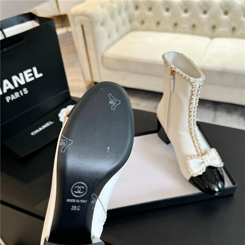 Ch**el white calfskin bow patent leather ankle boots