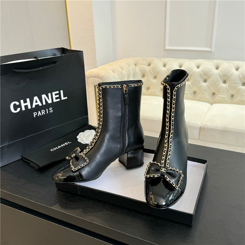 Ch**el black calfskin bow patent leather ankle boots