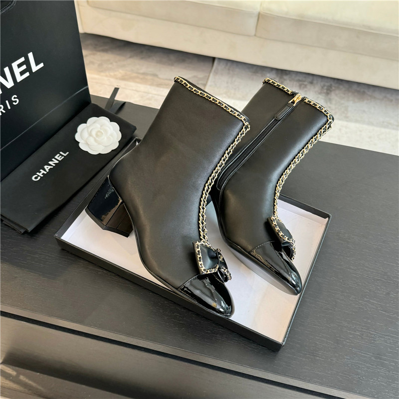 Ch**el black calfskin bow patent leather ankle boots