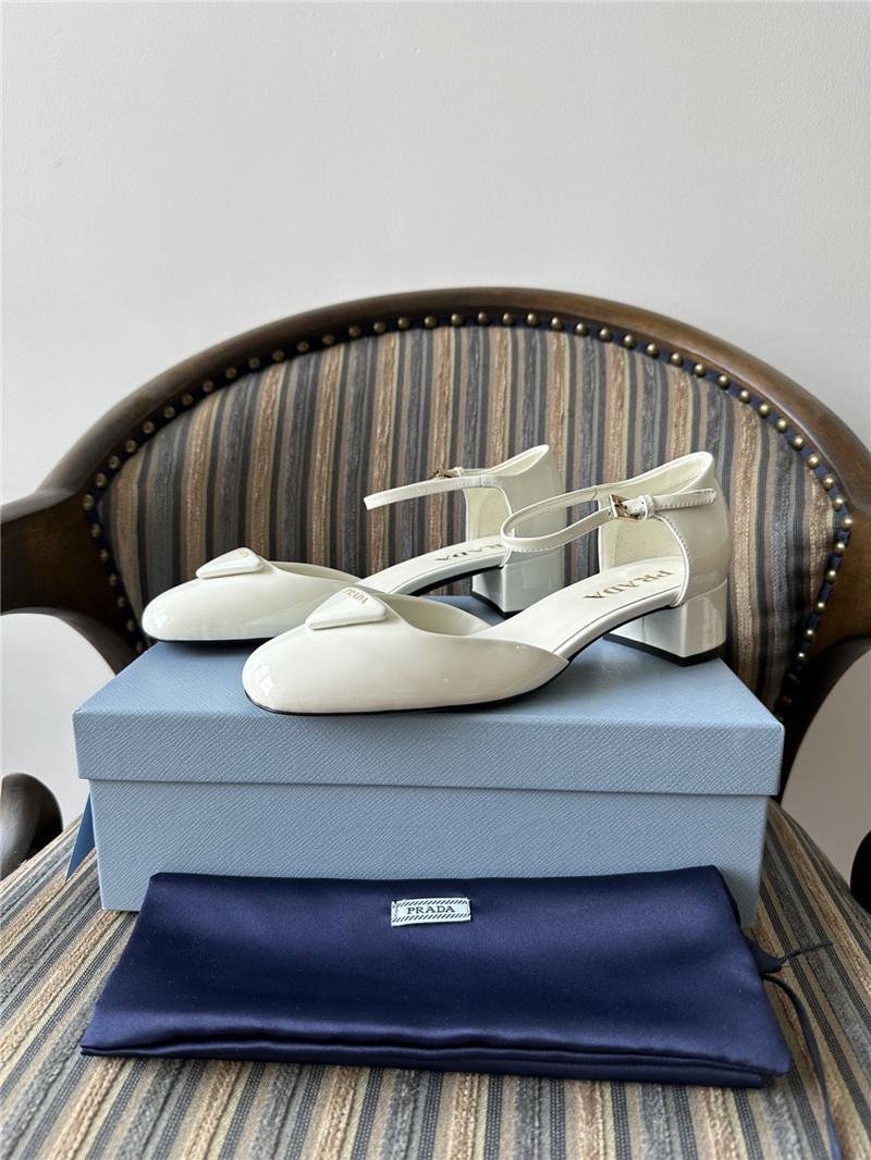 Pra*a white 35mm triangle-logo patent-leather pumps