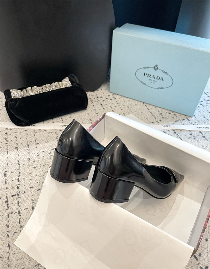 Pra*a triangle logo black brushed leather pumps