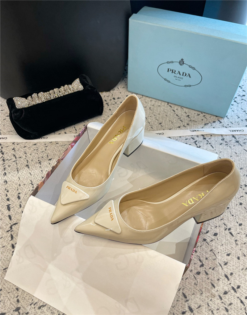 Pra*a triangle logo ivory brushed leather pumps