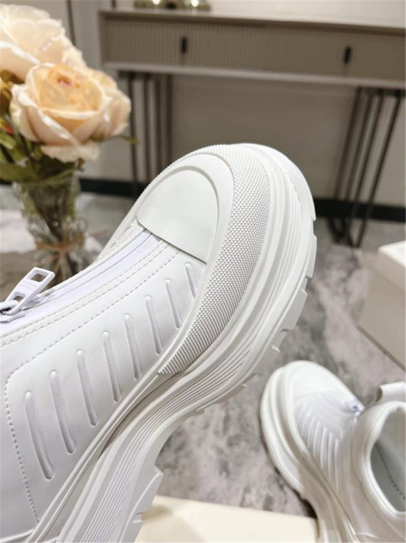 a1exa*der Mcqv*en white zip-up low top sneakers