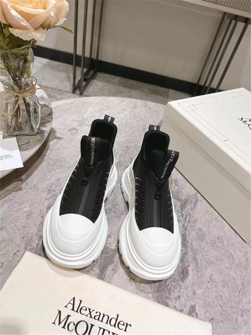 a1exa*der Mcqv*en zip-up low top sneakers