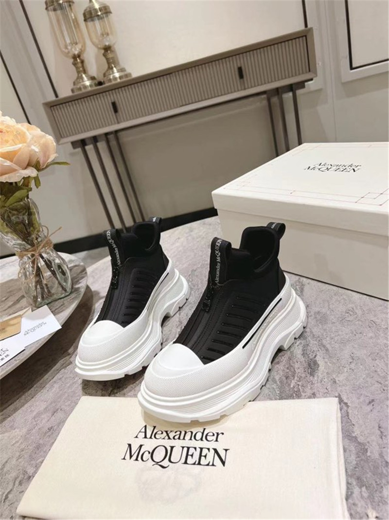 a1exa*der Mcqv*en zip-up low top sneakers