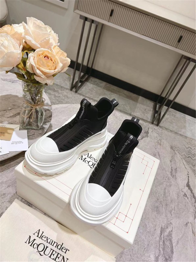 a1exa*der Mcqv*en zip-up low top sneakers