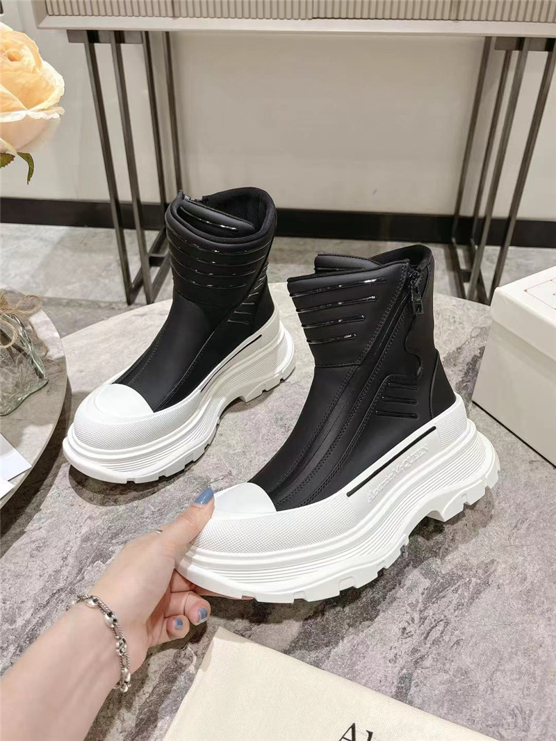 a1exa*der Mcqv*en tread slick high top sneakers
