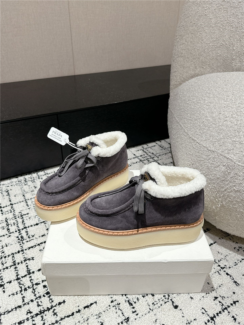 Pra*a gray suede shearling platform ankle boots