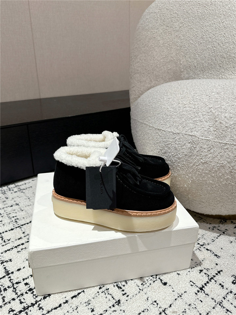 Pra*a suede shearling platform ankle boots