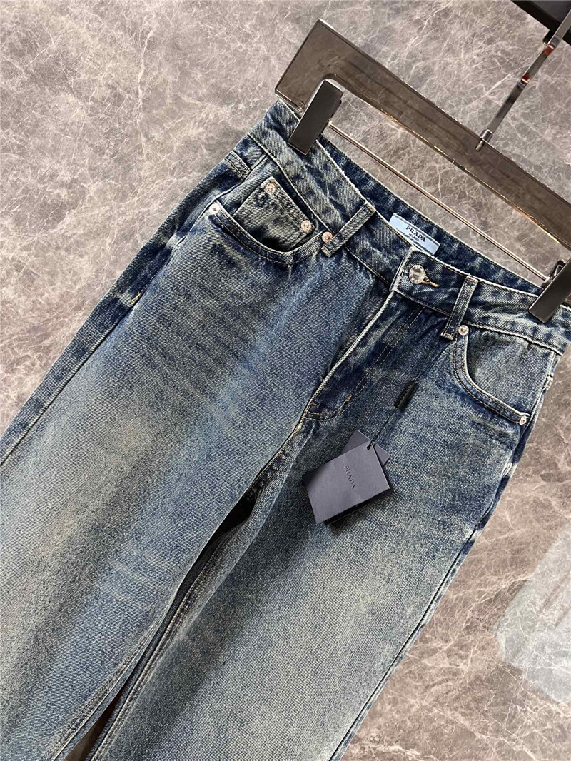 Pra*a triangle logo denim trousers