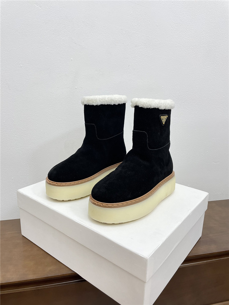 Pra*a triangle-logo platform black suede boots