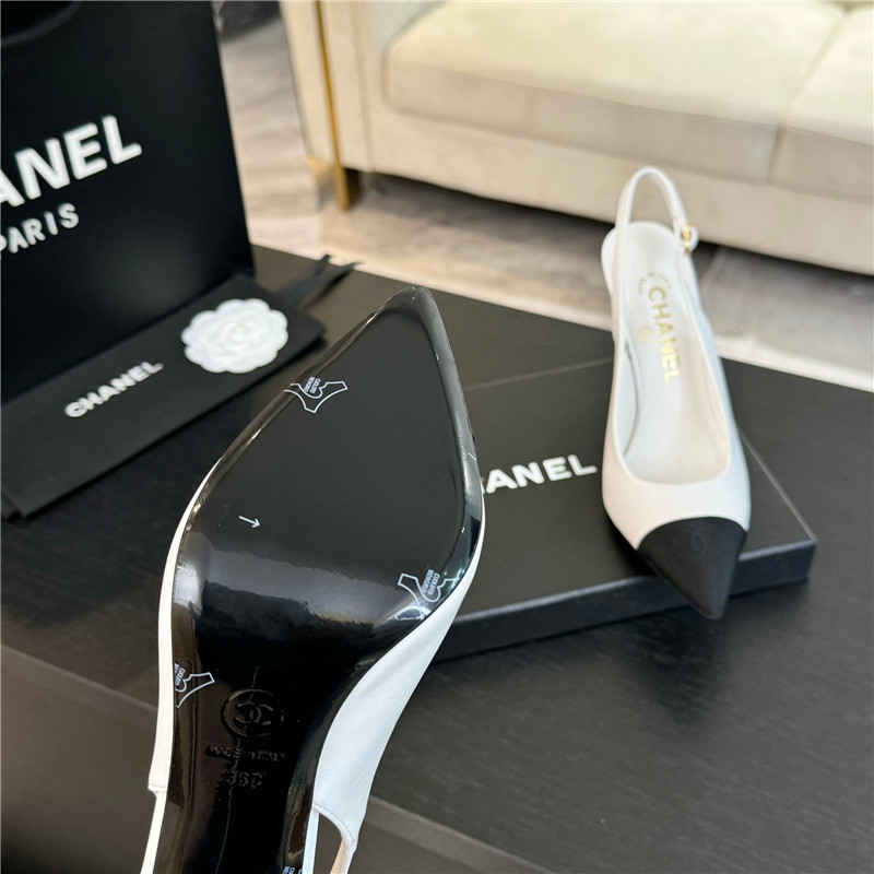 Ch**el pointed heel slingbacks in ivory/black calfskin