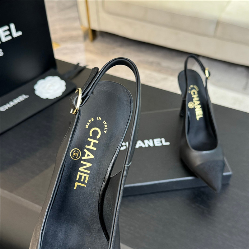 Ch**el pointed heel slingbacks in black leather/grosgrain