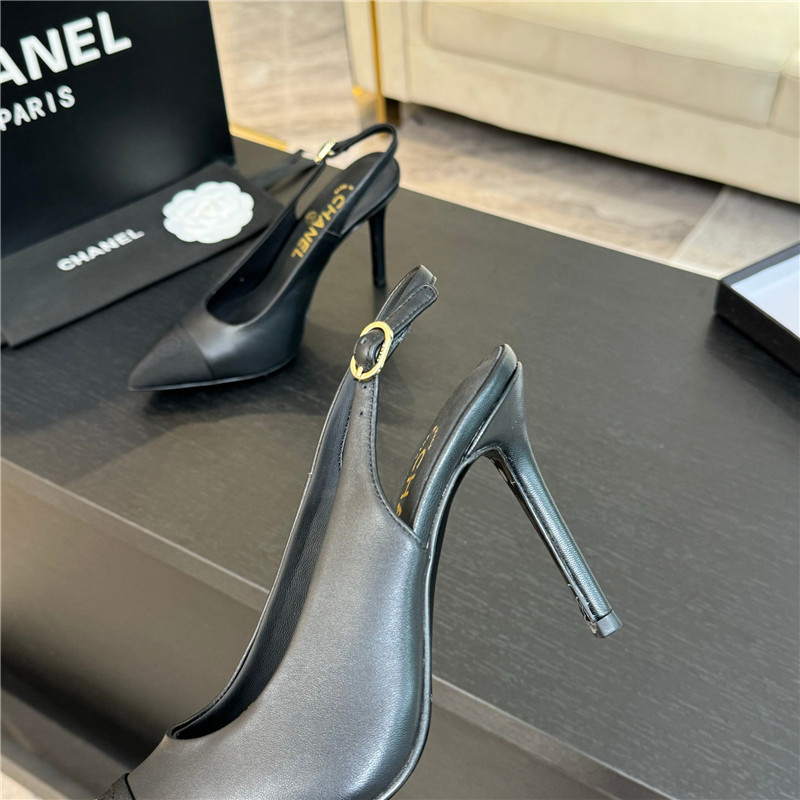 Ch**el pointed heel slingbacks in black leather/grosgrain