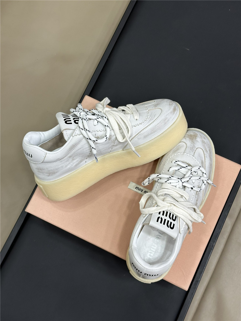 Miu Miu Bleached Leather Low Top Sneakers