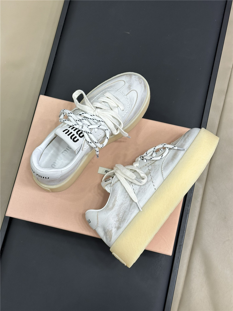 Miu Miu Bleached Leather Low Top Sneakers