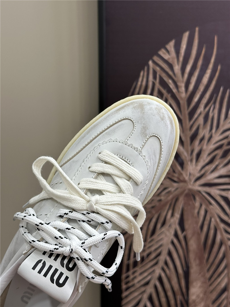 Miu Miu Bleached Leather Low Top Sneakers