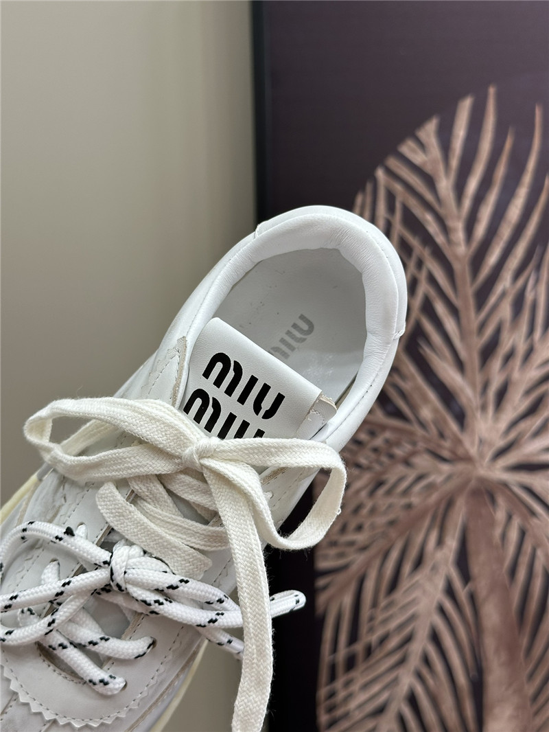 Miu Miu Bleached Leather Low Top Sneakers